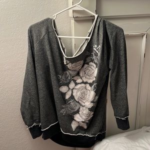 Vanity brand size large. Grey sweater. With white floral design.